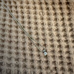 14K White Gold beaded necklace with Diamond solitare pendant.